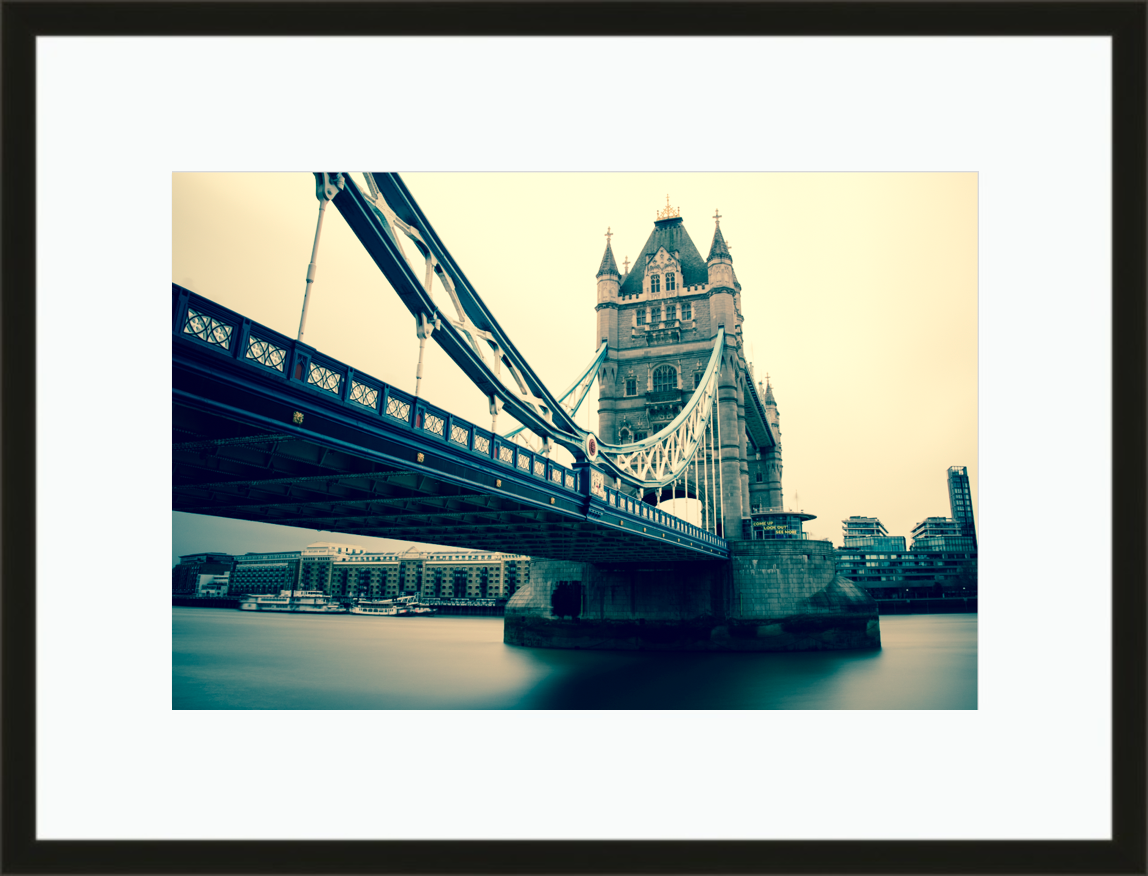 Framed and mounted photograph of Tower Bridge on the river Thames in central London